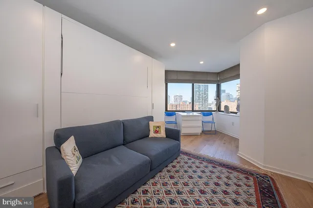 a room with stairs and furniture