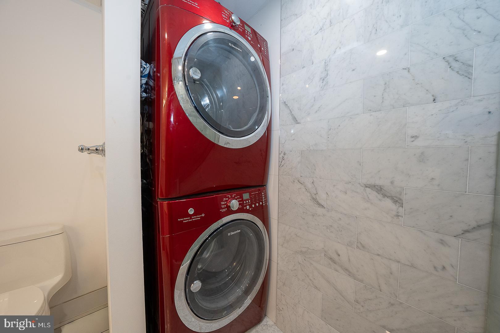 202-10 West Rittenhouse Square, Unit 1205 Philadelphia, PA 19103 - Photo 19 of 28 a utility room with dryer and washer