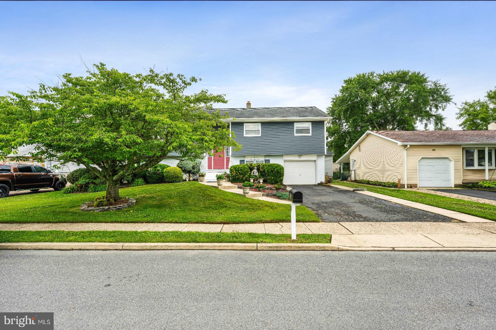 8 Dan Road Hamilton, NJ 08620 - Photo 4 of 49 Charming home with lush greenery.