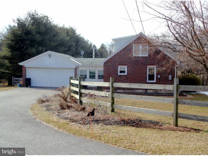 102 Shearers Road Reading, PA 19608 - Photo 3 of 21 a front view of a house with garden