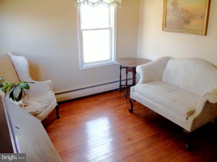 102 Shearers Road Reading, PA 19608 - Photo 6 of 21 a living room with furniture and a window