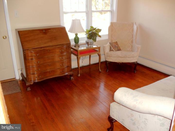 102 Shearers Road Reading, PA 19608 - Photo 7 of 21 a living room with furniture and a wooden floor