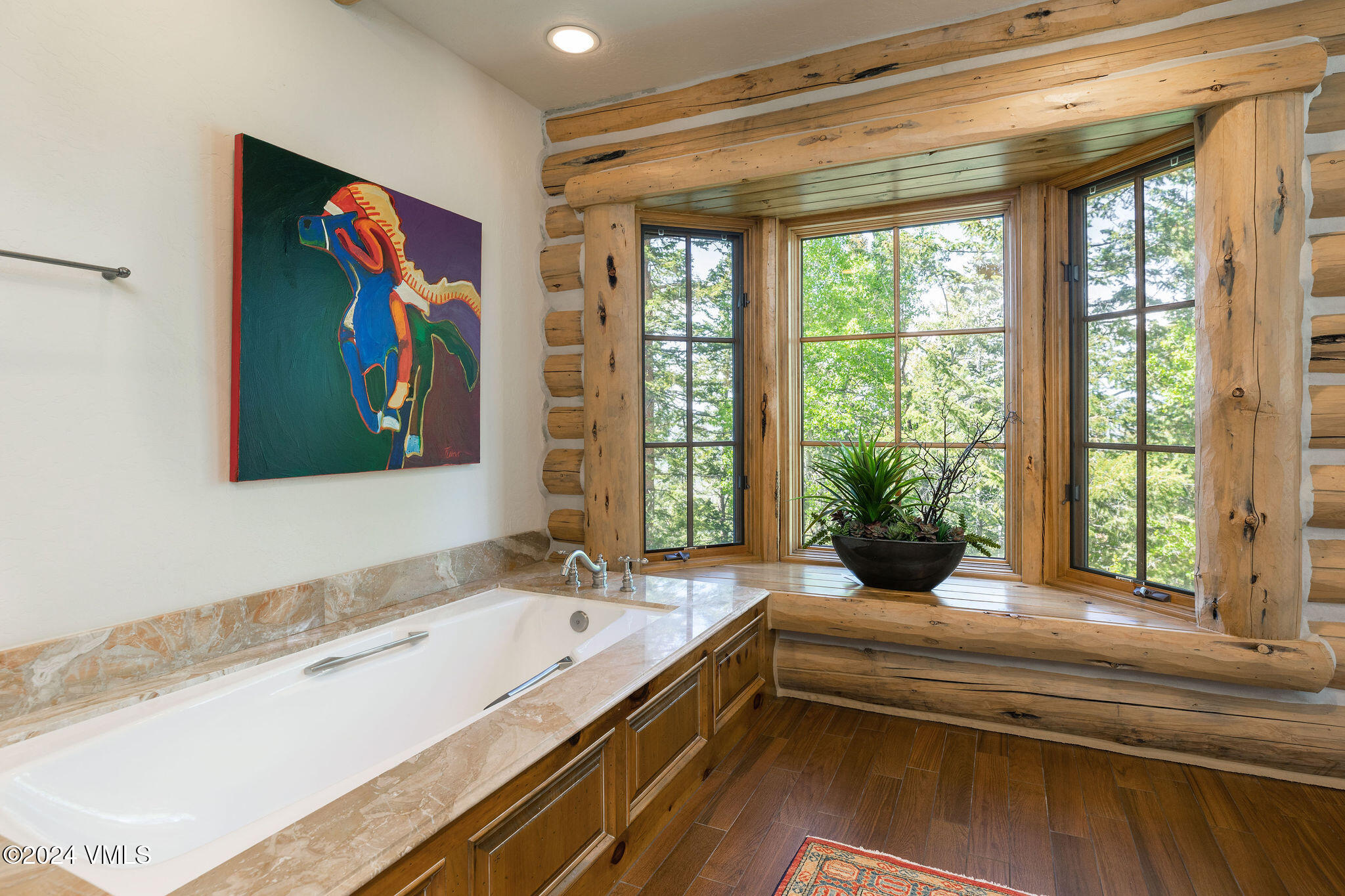 57 Travis Road Wolcott, CO 81655 - Photo 15 of 26 a bathroom with a bathtub and a large window