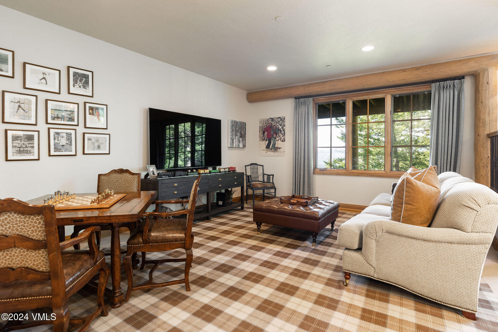 57 Travis Road Wolcott, CO 81655 - Photo 20 of 26 a living room with furniture and a large window