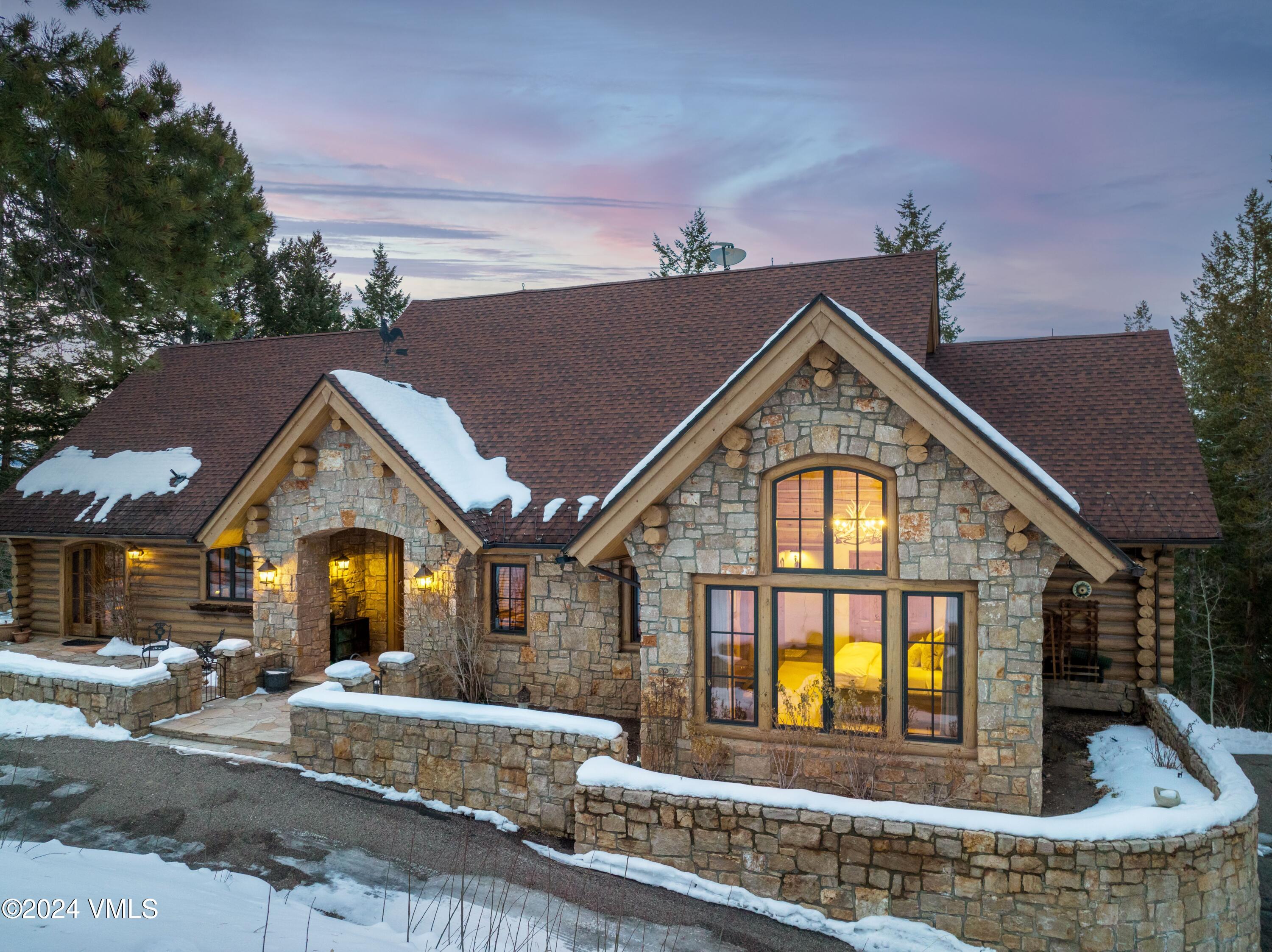 57 Travis Road Wolcott, CO 81655 - Photo 2 of 26 a front view of a house with garden