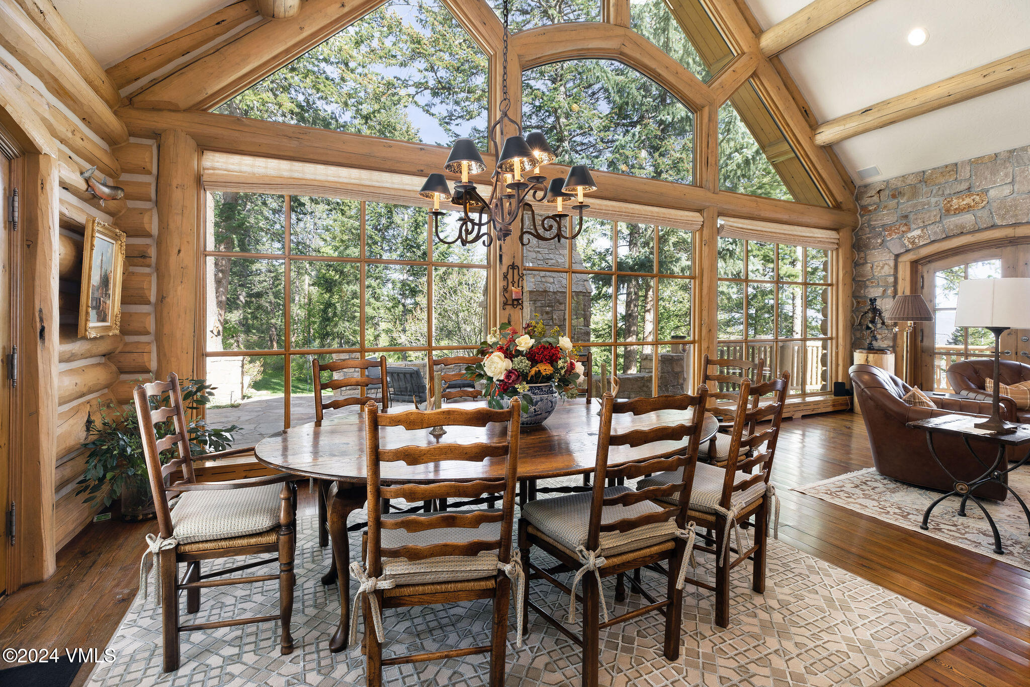 57 Travis Road Wolcott, CO 81655 - Photo 8 of 26 a view of a dining room with furniture wooden floor and a chandelier