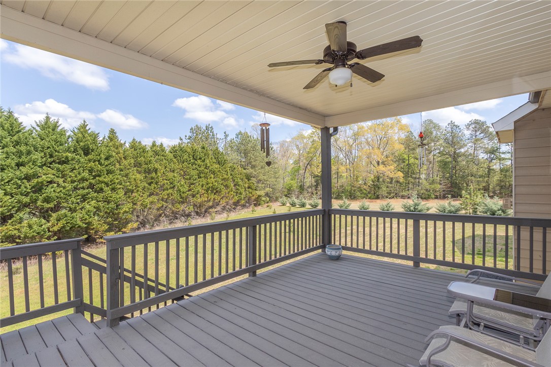 22 Old American Boulevard Pendleton, SC 29670 - Photo 11 of 49 This spacious deck offers tranquil views, perfect for outdoor relaxation.