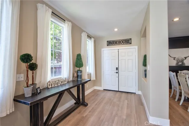 a view of a dining room with furniture window and outside view