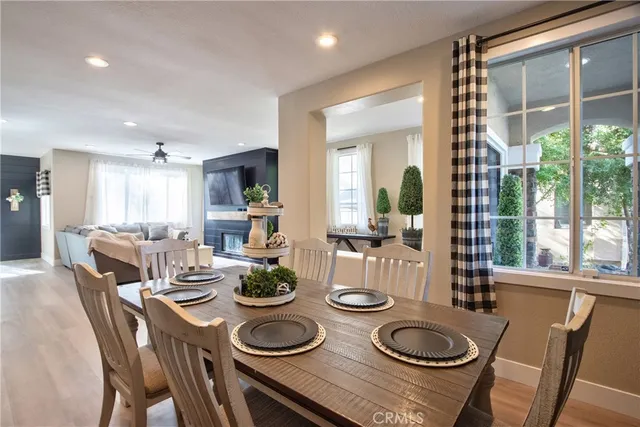 a view of a dining room with furniture window and outside view
