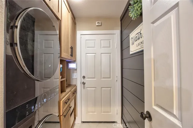 a view of a bedroom with a flat screen tv