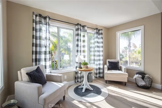 a bathroom with a sink a toilet a mirror and shower