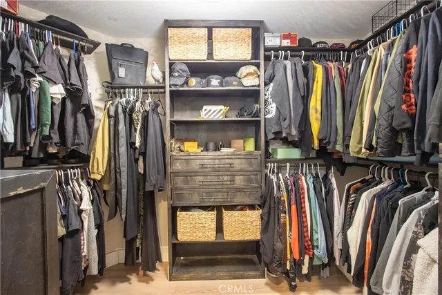 a bathroom with a double vanity sink toilet and shower