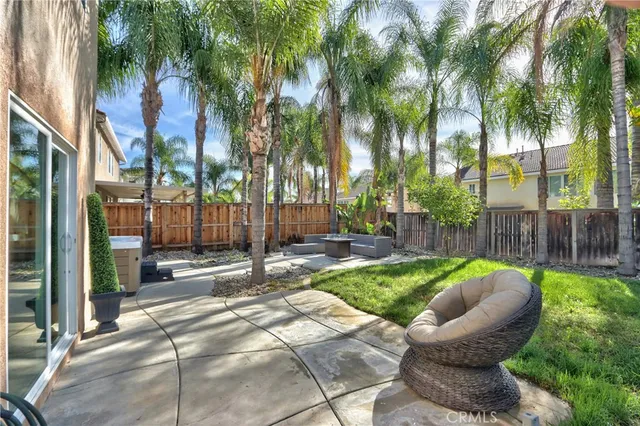 a front view of house with yard and outdoor seating
