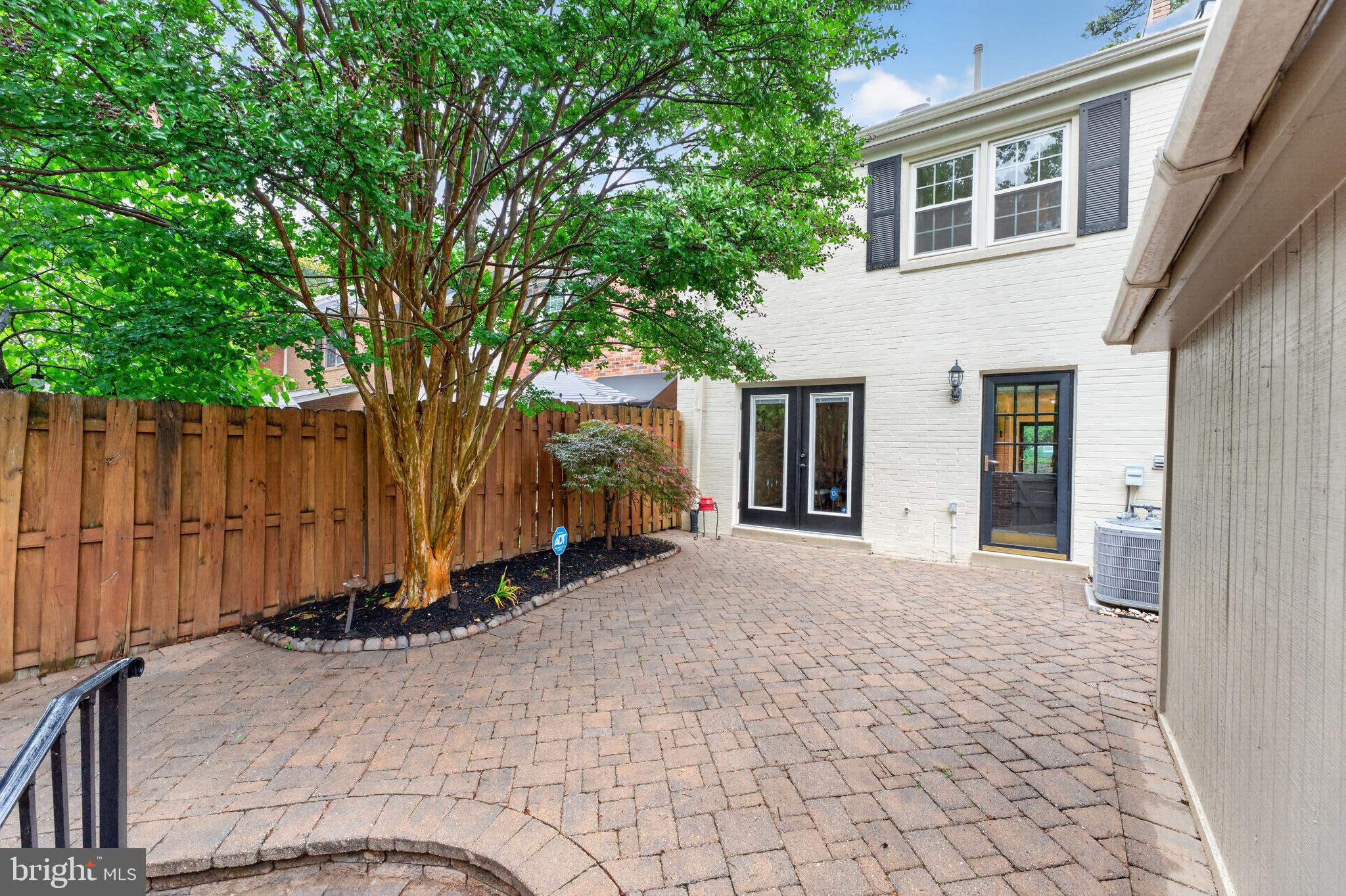 8139 Carrleigh Parkway Springfield, VA 22152 - Photo 14 of 27 a view of a house with a backyard