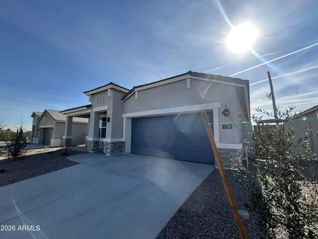a view of a house with a street