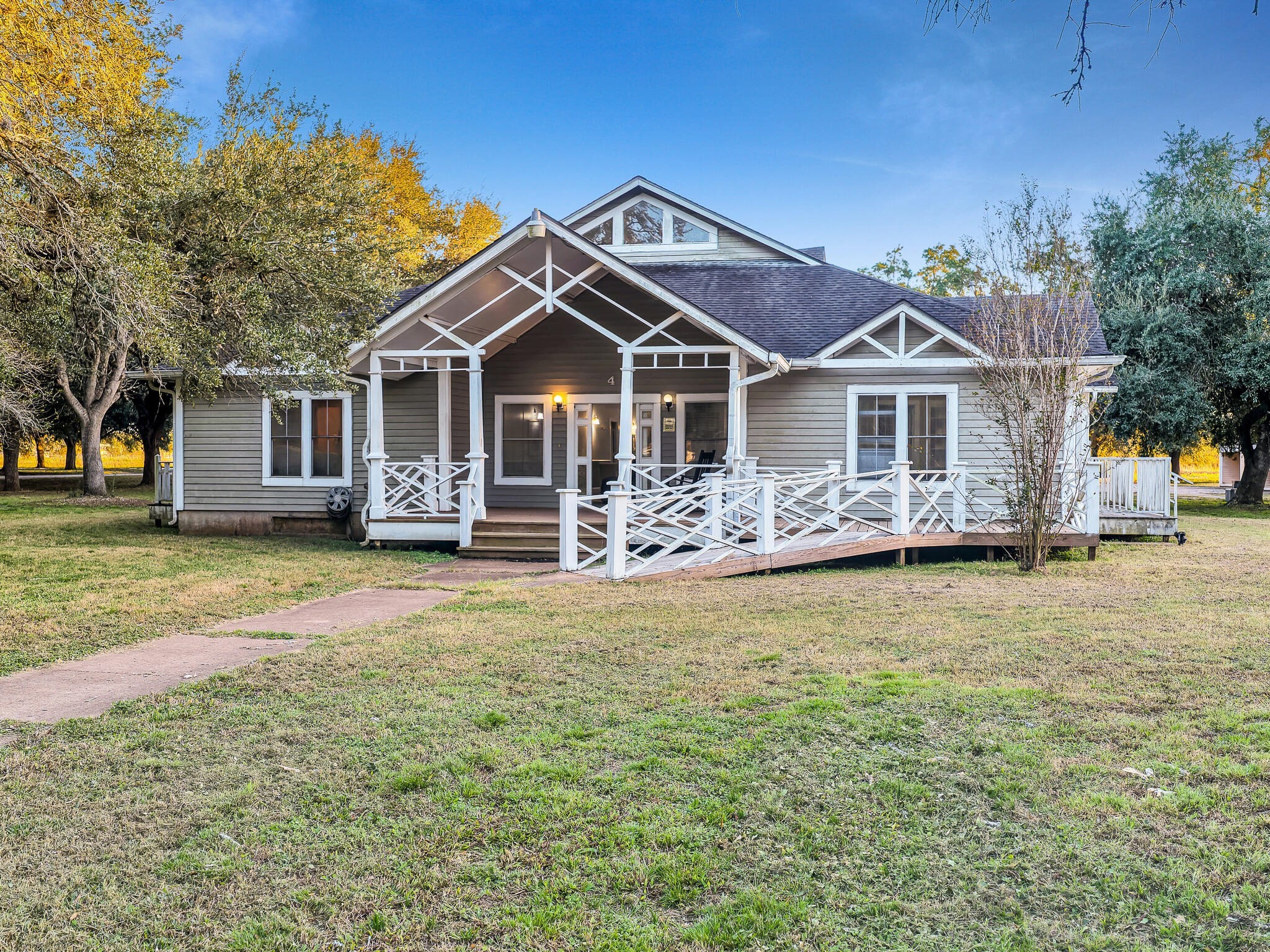 4073 Fm 3318 Road Brookshire, TX 77423 - Photo 29 of 50 a front view of a house with a yard patio and fire pit