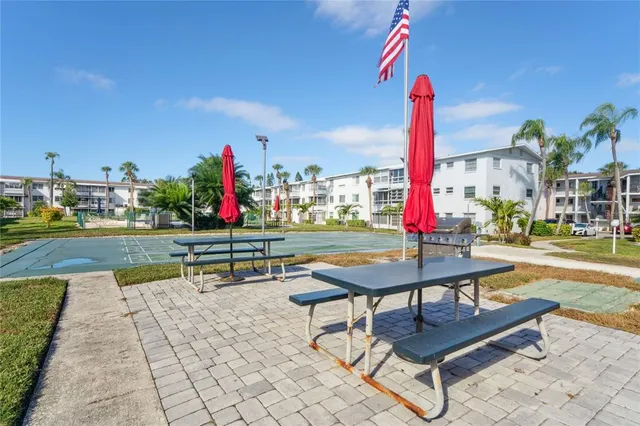 a view of a terrace with sitting area