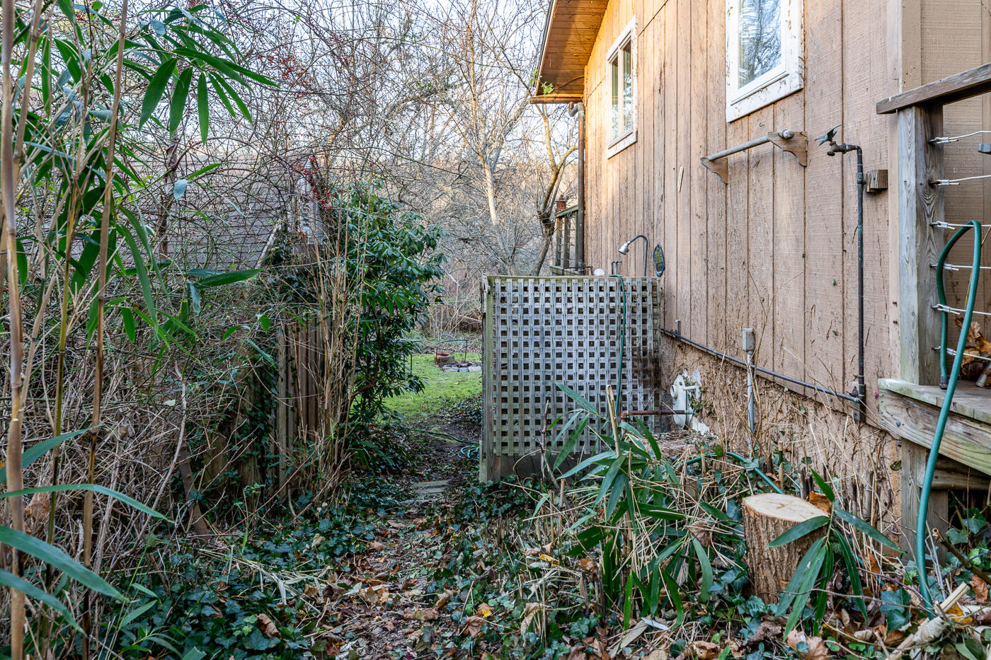 336 Main Street Wellfleet, MA 02667 - Photo 13 of 39 a garden view with iron fence