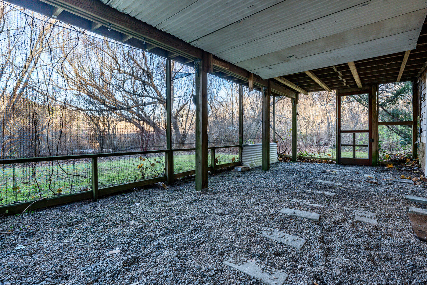336 Main Street Wellfleet, MA 02667 - Photo 16 of 39 a view of a backyard with large trees