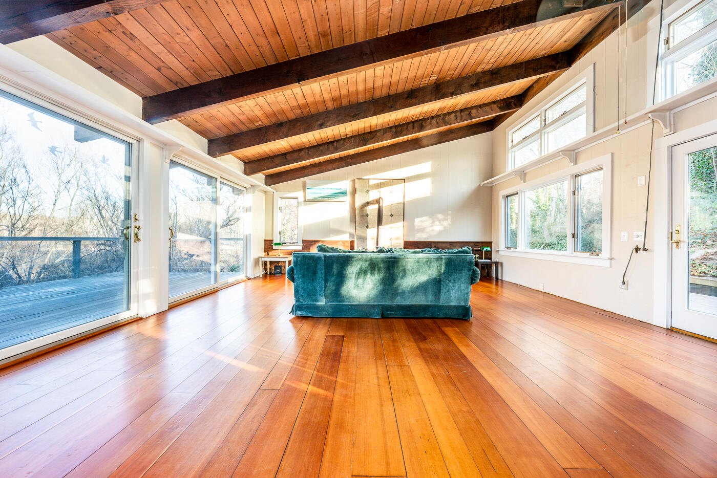 336 Main Street Wellfleet, MA 02667 - Photo 2 of 39 a view of an empty room with wooden floor and a window