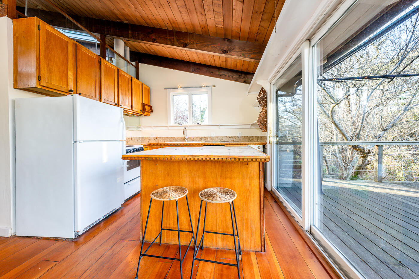 336 Main Street Wellfleet, MA 02667 - Photo 21 of 39 a view of a kitchen with a tub and wooden floor