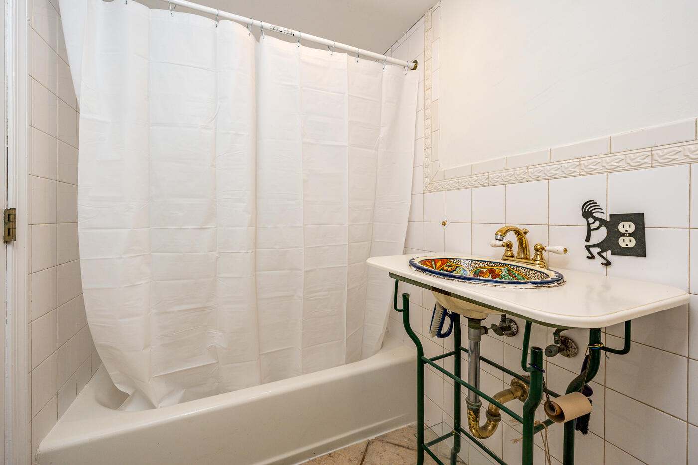 336 Main Street Wellfleet, MA 02667 - Photo 29 of 39 a bathroom with a sink and a bathtub