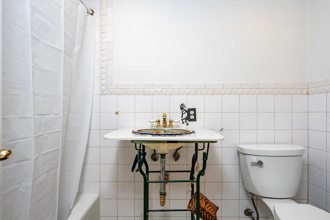 336 Main Street Wellfleet, MA 02667 - Photo 30 of 39 a bathroom with a sink a toilet and a mirror