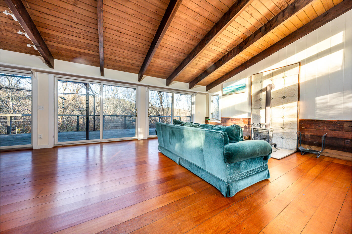336 Main Street Wellfleet, MA 02667 - Photo 3 of 39 a living room with furniture wooden floor and a large window
