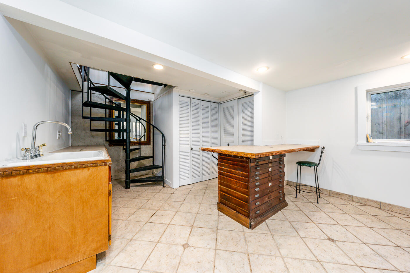 336 Main Street Wellfleet, MA 02667 - Photo 36 of 39 a room with stairs and a table