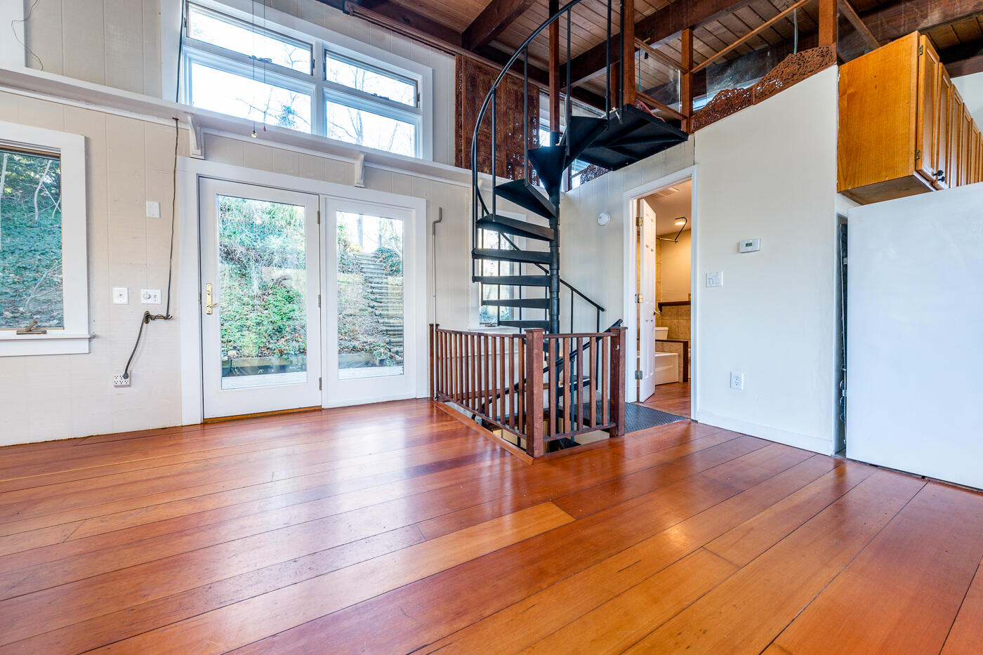 336 Main Street Wellfleet, MA 02667 - Photo 5 of 39 a view of an empty room with wooden floor and a window