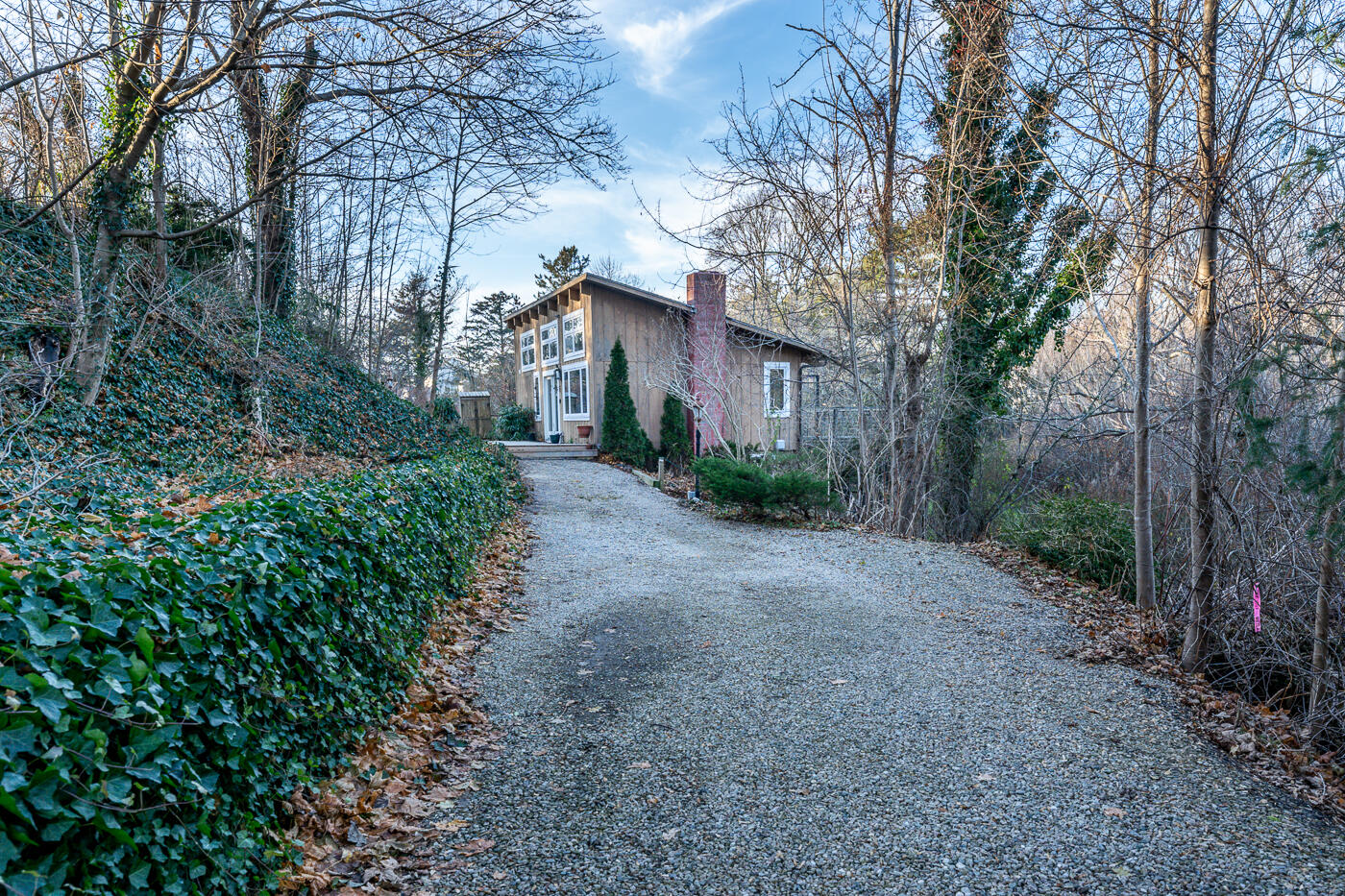336 Main Street Wellfleet, MA 02667 - Photo 6 of 39 a house with trees in front of it