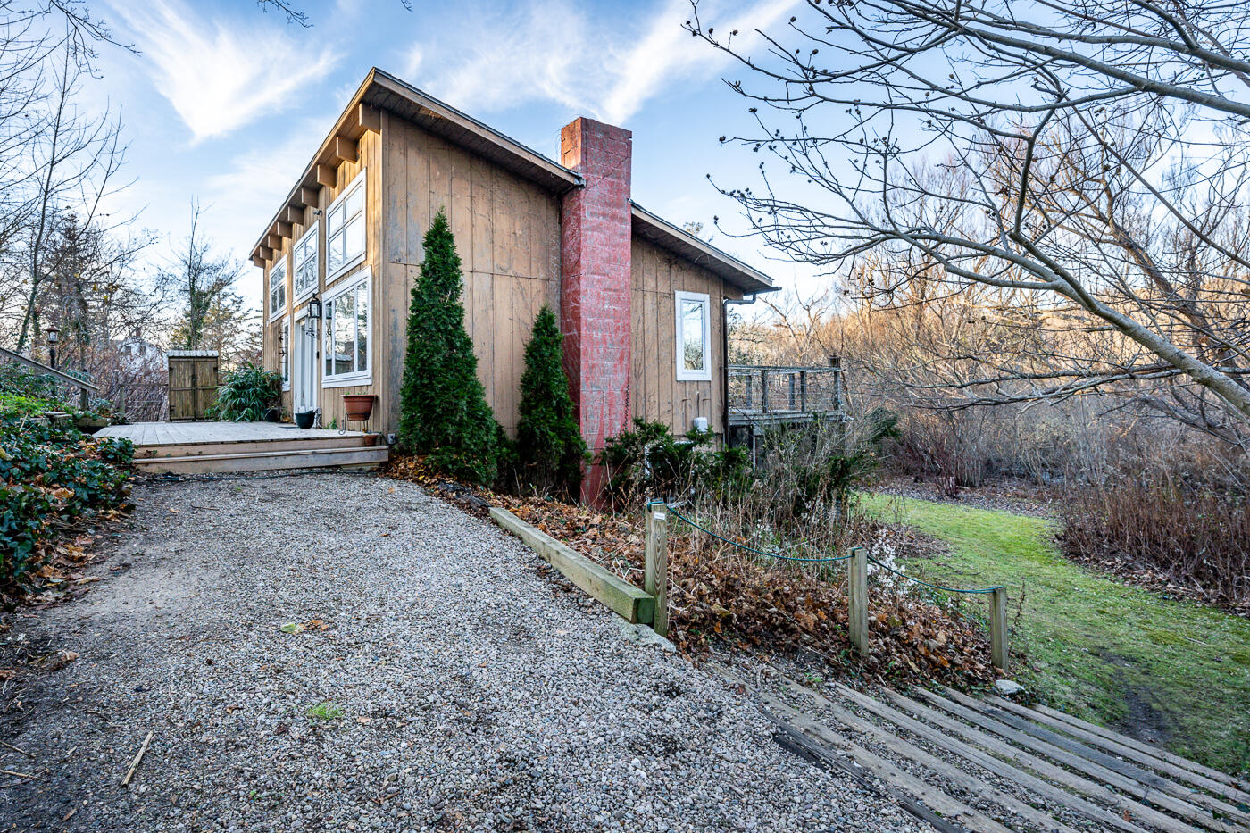 336 Main Street Wellfleet, MA 02667 - Photo 8 of 39 a view of a house with a yard