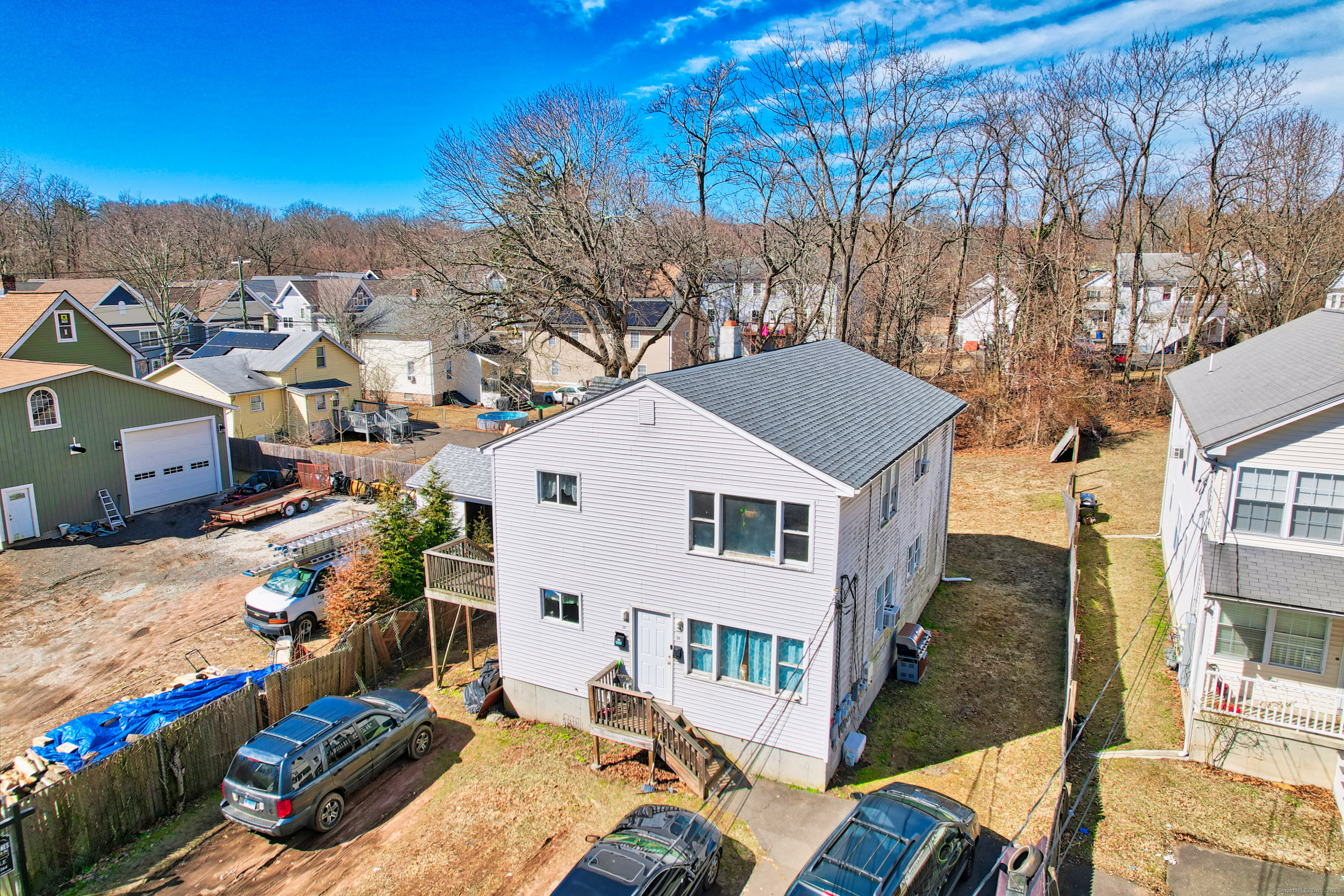 a aerial view of a house with a yard