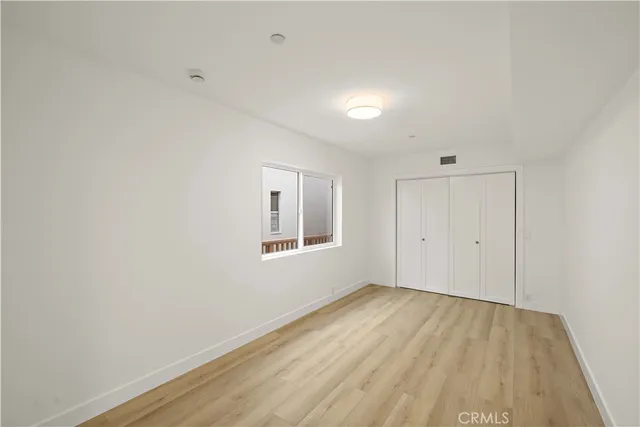 a view of empty room with windows