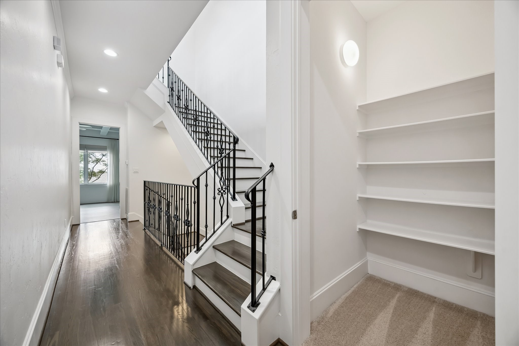 1208 Welch Street Houston, TX 77006 - Photo 24 of 35 Beside the stairway to the third floor is the large walk-in storage closet which is also the shaft for an elevator, if you should choose to install one.