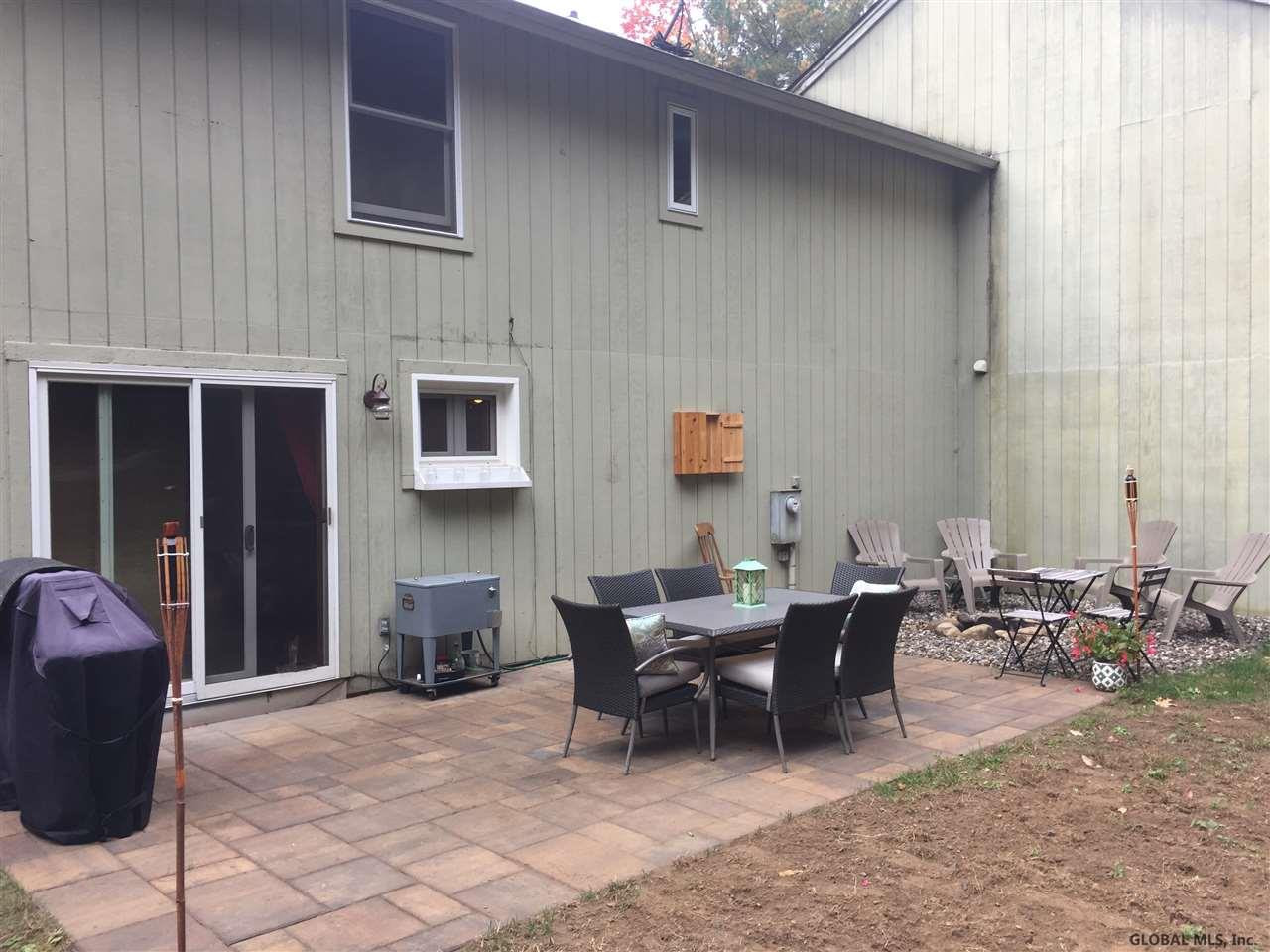 261 Thimbleberry Road Malta, NY 12020 - Photo 20 of 21 New patio, fire pit, partial fenced yard