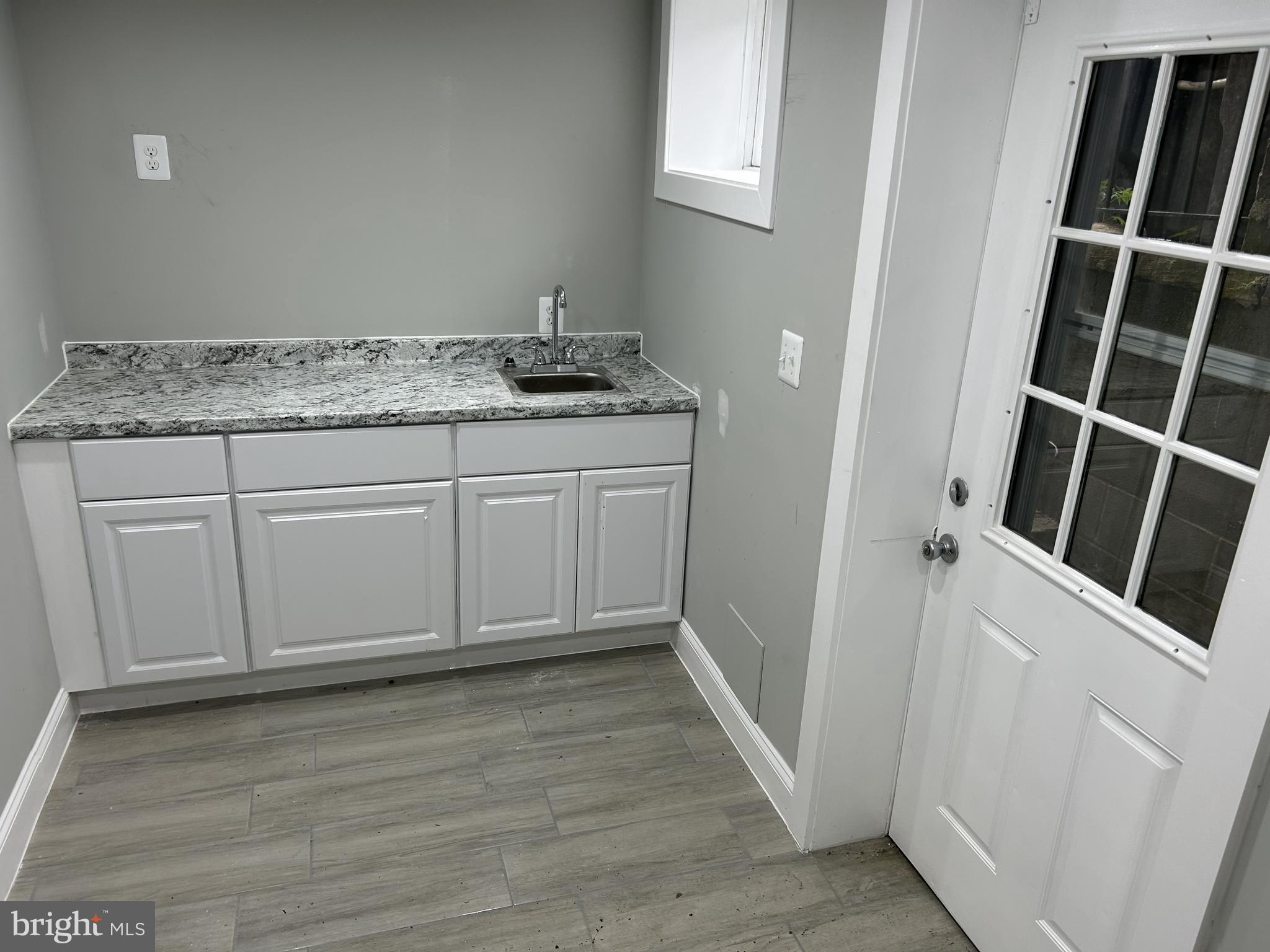 928 Perry Place Northeast Washington, DC 20017 - Photo 14 of 16 a view of a storage & utility room in a house