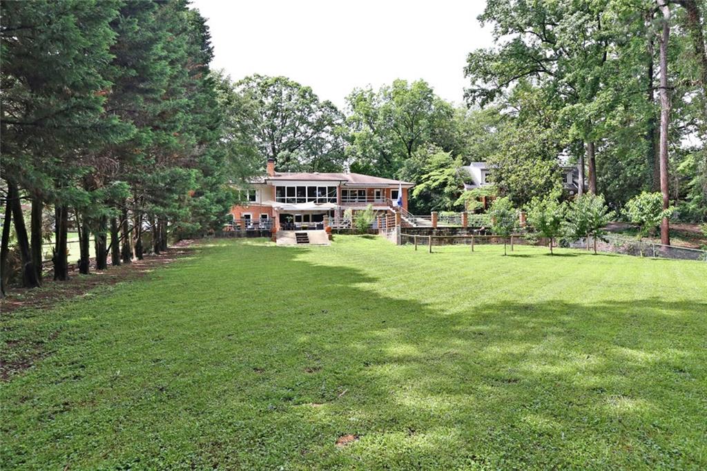 655 Clairemont Avenue Decatur, GA 30030 - Photo 1 of 1 This view is from the backyard. 0.91 acres. This home is much larger than it looks!