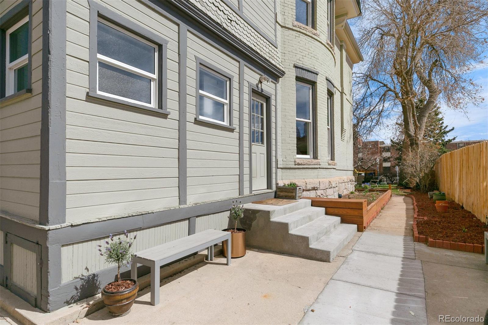 5127 Lowell Boulevard Denver, CO 80221 - Photo 34 of 39 a view of a building with sitting area