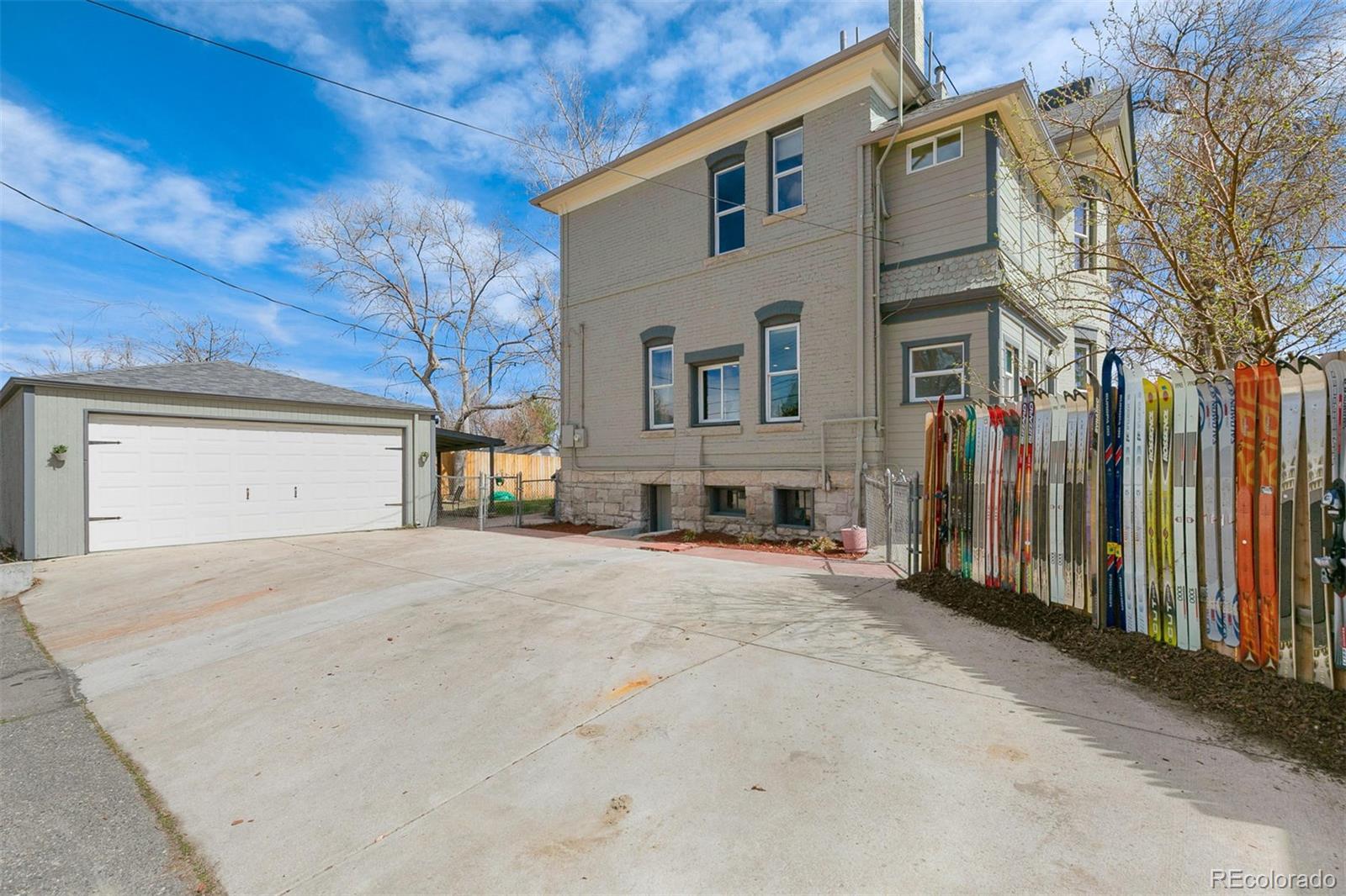 5127 Lowell Boulevard Denver, CO 80221 - Photo 35 of 39 a view of a house with a patio