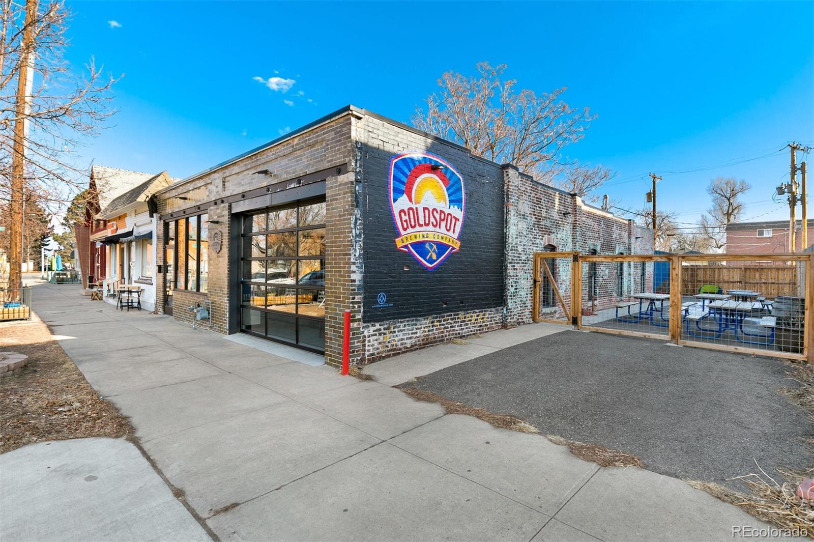 5127 Lowell Boulevard Denver, CO 80221 - Photo 36 of 39 a view of a street with seating space