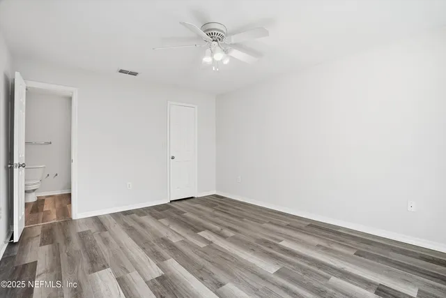 a view of a room with racks on the wall