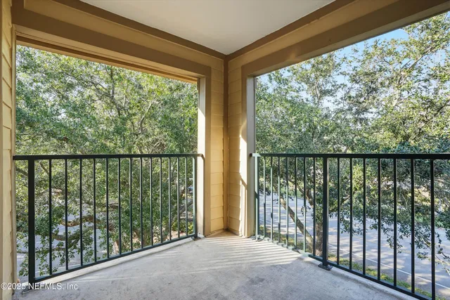 a dining room with furniture and outdoor view