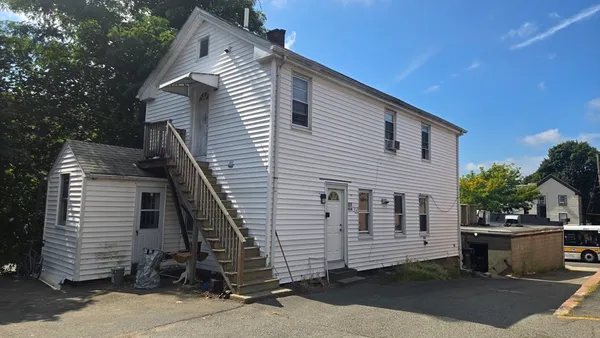 a view of a house with a garage