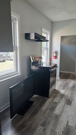 a room with furniture and window