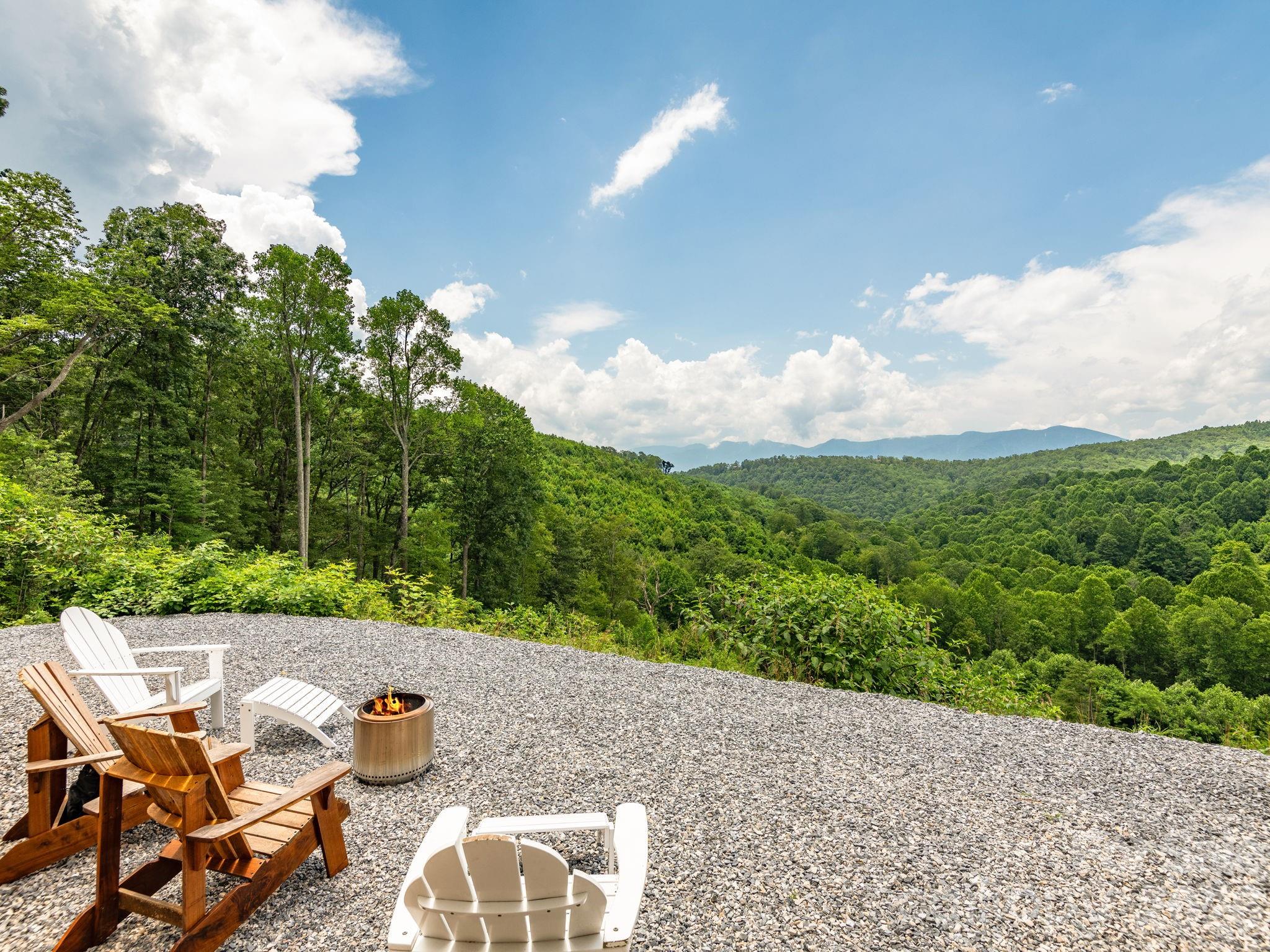 511 Emerald Mine Road Spruce Pine, NC 28777 - Photo 18 of 23 a view of yard from terrace with seating space