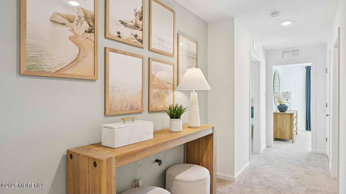 60 Penny Lane Neptune Township, NJ 07753 - Photo 21 of 37 a bathroom with a sink a toilet and a mirror