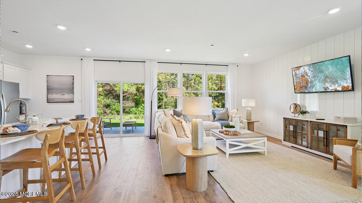 60 Penny Lane Neptune Township, NJ 07753 - Photo 6 of 37 a living room with furniture and a flat screen tv