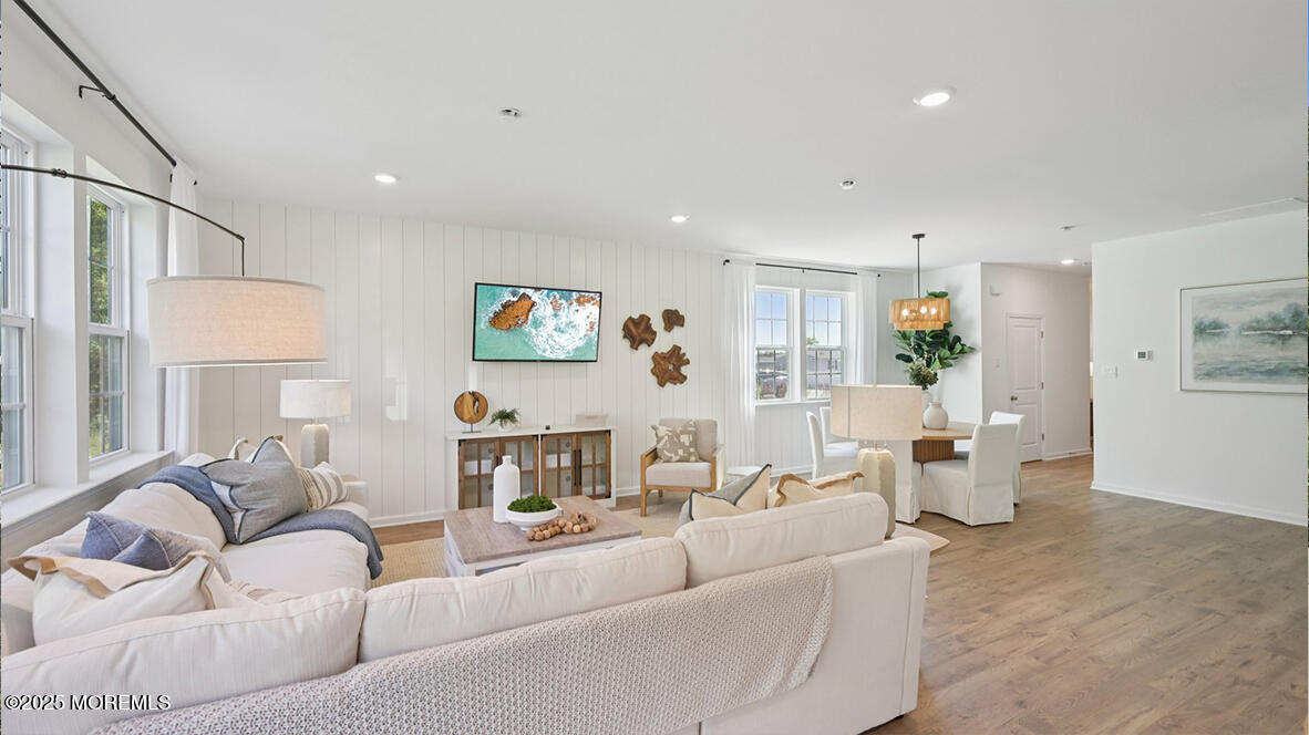 60 Penny Lane Neptune Township, NJ 07753 - Photo 7 of 37 a living room with furniture and a wooden floor