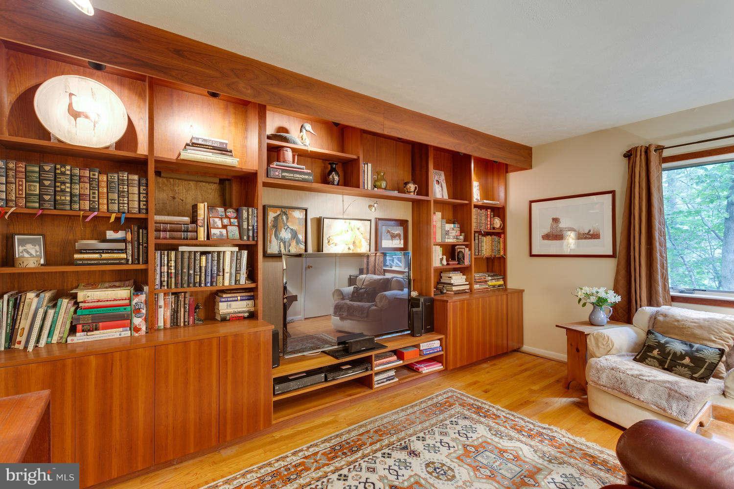 40010 New Road Aldie, VA 20105 - Photo 11 of 30 Den features teakwood wall unit with accent lights